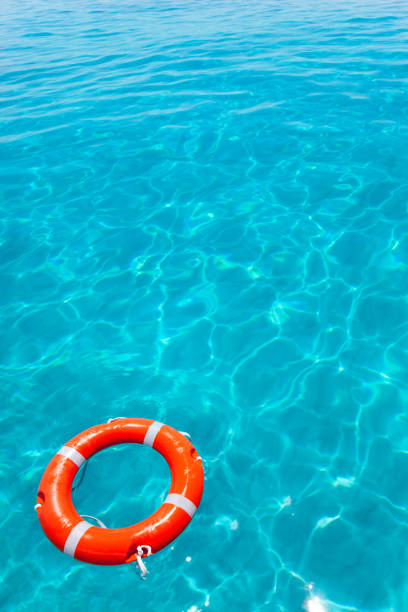 istock Buoy orange floating in perfect tropical beach 1336104678