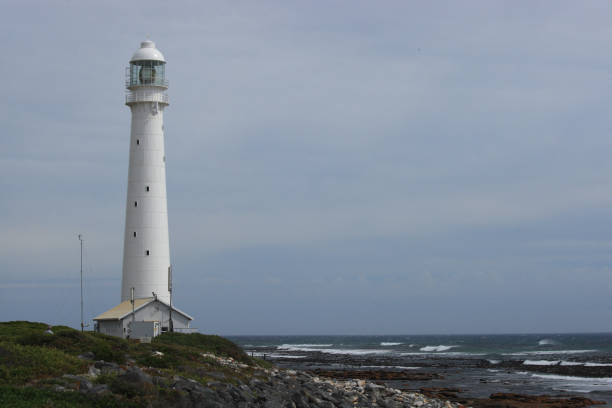 Slangkop Lighthouse, Kommetjie, Cape Town, South Africa Slangkop Lighthouse, Kommetjie, Cape Town, South Africa kommetjie stock pictures, royalty-free photos & images