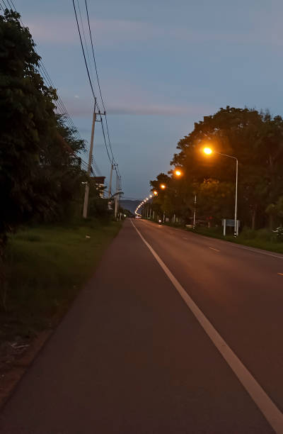 istock rural road atmosphere at dusk 1336115215