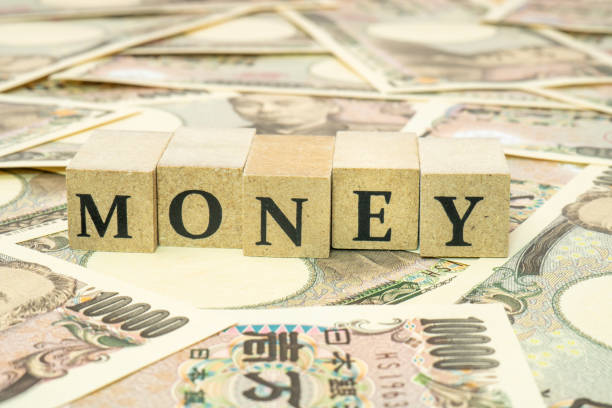 istock Concept of money (many Japanese banknotes and MONEY characters) 1336116731