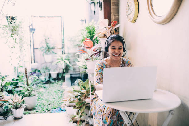 istock asian woman home schooling 1336117058