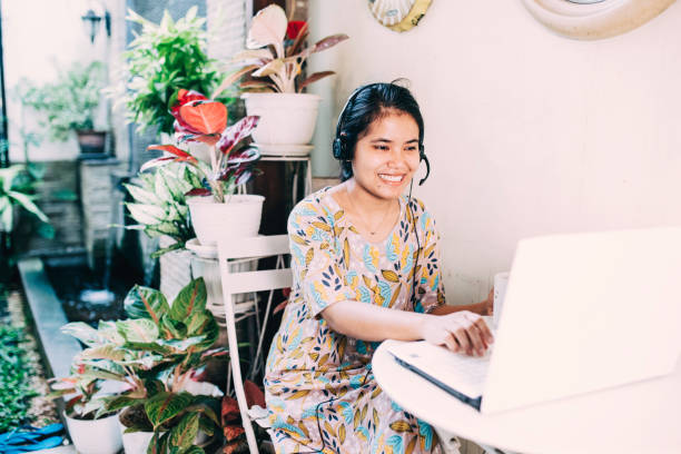 istock asian woman home schooling 1336117065