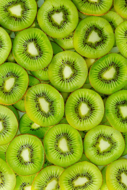 istock Kiwi Macro,slice of kiwi fruit on a full frame. horizont 1336118039