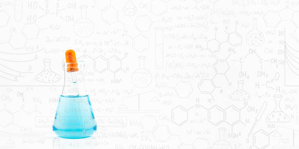 Blue science glass tube experiment on white background,Hand drawn science formulas on chalkboard for background.