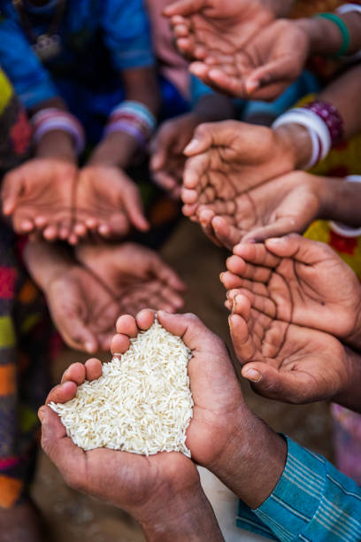 istock Poor Indian children asking for food, India 1336118641