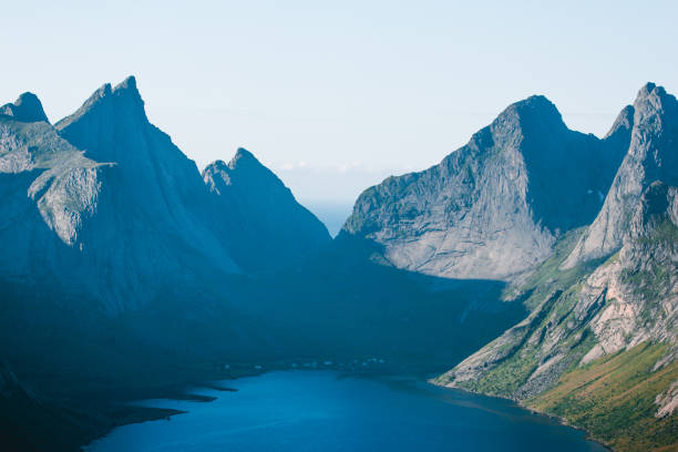 istock Fjord with mountain peaks 1336121267