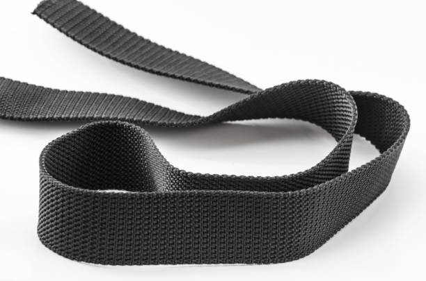 istock rough textured black nylon fabric belt isolated 1336121490