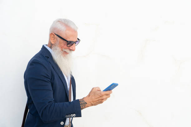 istock Senior man with a phone 1336123990