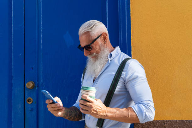 istock Senior man with a phone 1336124017
