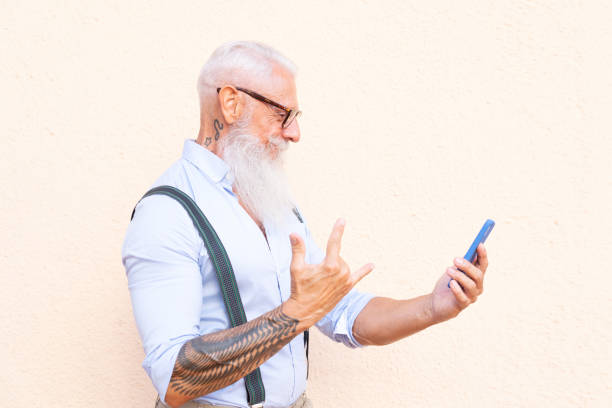 istock Senior man with a phone 1336124046