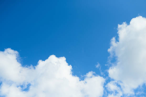 istock Natural daylight and white clouds floating on blue sky 1336127451