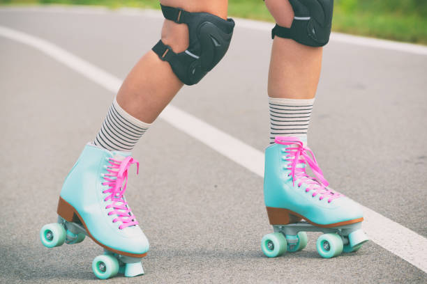 istock Woman rollerskater wearing knee protector pads 1336129338