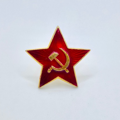 Red star with sickle and hammer