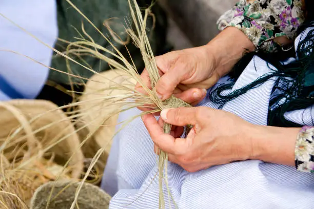 esparto woman hands handcrafts Mediterranean Balearic Islands