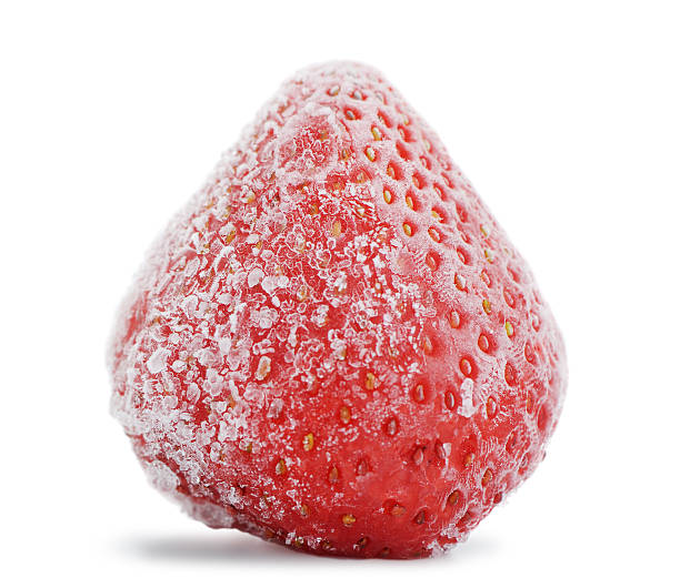 The frozen strawberry stock photo