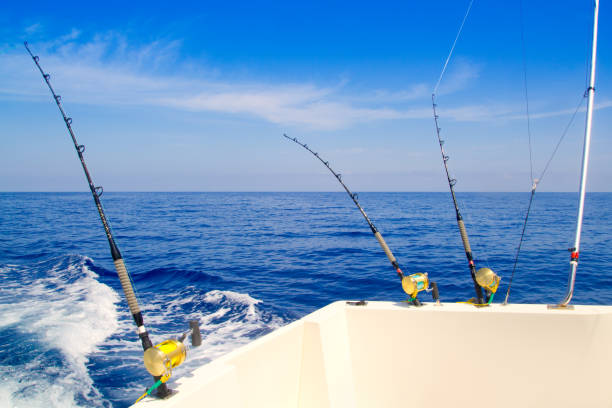 istock boat fishing trolling in deep blue sea 1336133518