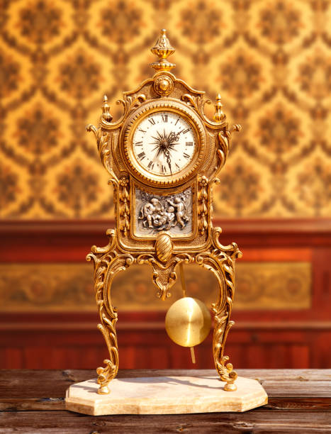 istock ancient vintage brass pendulum clock in classic indoor 1336134278