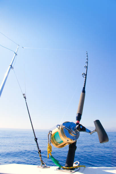 istock fishing boat trolling with outrigger gear 1336134467