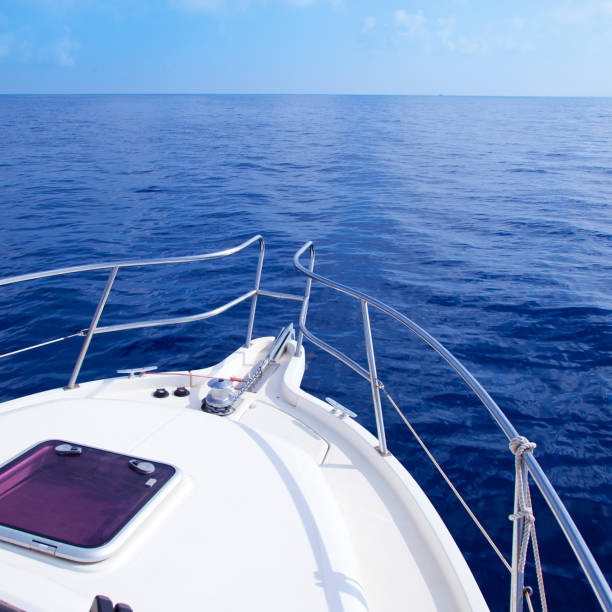 istock Boat bow sailing in blue Mediterranean sea 1336134711