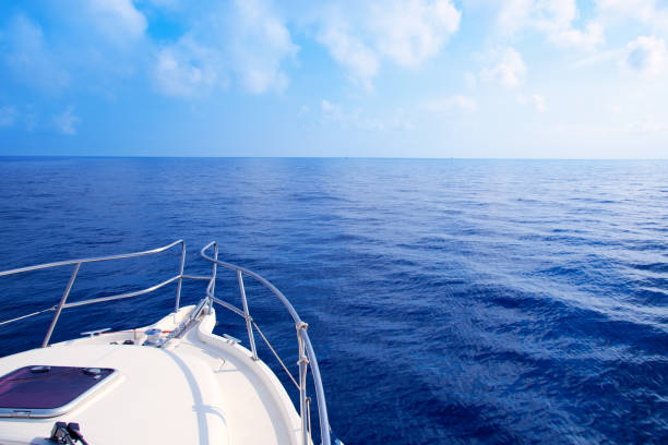 Boat bow sailing in blue Mediterranean sea
