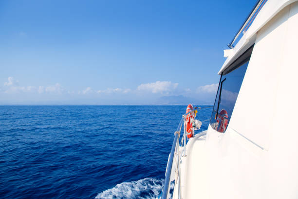 istock Boat bow sailing in blue Mediterranean sea 1336134747