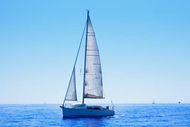 istock blue sailboat sailing mediterranean sea 1336134770