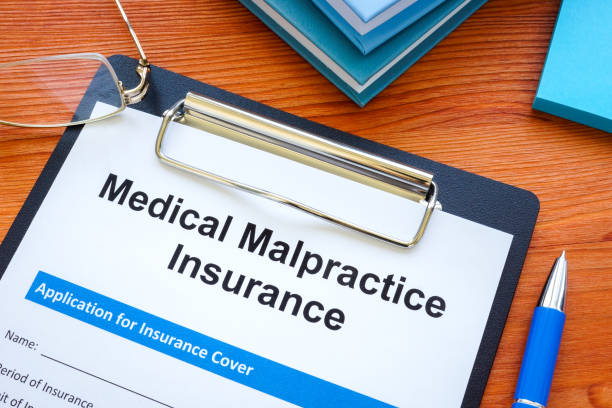 istock The Medical malpractice insurance application and clipboard. 1336139718