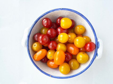 close-up of colorful cherry tomatoes in a bowl