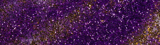 istock Bright purple and gold sequins in a narrow stripe. 1336148050