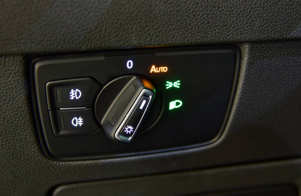 Closeup image of car lighting control switch stock photo