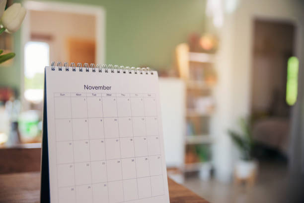 istock Calendar desk place on table. Desktop Calender for Planner to plan agenda, timetable, appointment, organization, management each date, month, and year on wooden office table.Calendar Concept. 1336150561