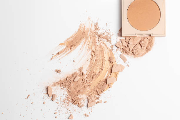 istock Set with Crashed beige face finishing and bronzing powder  isolated on white background 1336151028