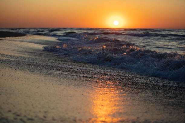 istock Beautiful sea landscape. Sunset and waves. 1336152410