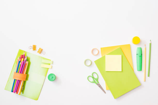 istock Flat lay frame with school and office supplies on a white background 1336154623