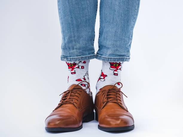 istock Men's legs, trendy shoes and bright socks 1336162016