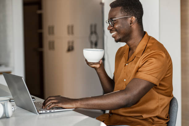 istock Young man working on the laptop 1336162091