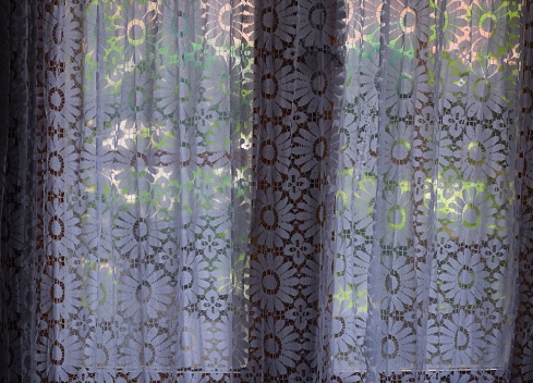 Window with vintage rustic curtains