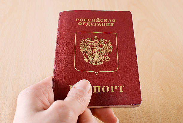 istock Russian Traveling Passport in hand. 133616276