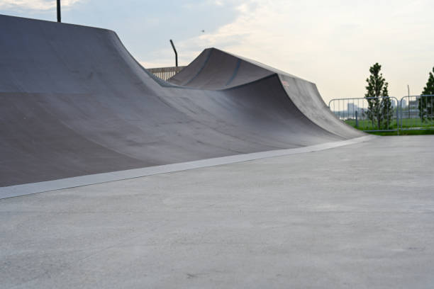 The skate park, rollerdrome, quarter and half pipe ramps. Extreme sport, youth urban culture for teen street activity. stock photo