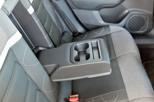 istock Armrest in the car with cup holder for rear seats row 1336171690
