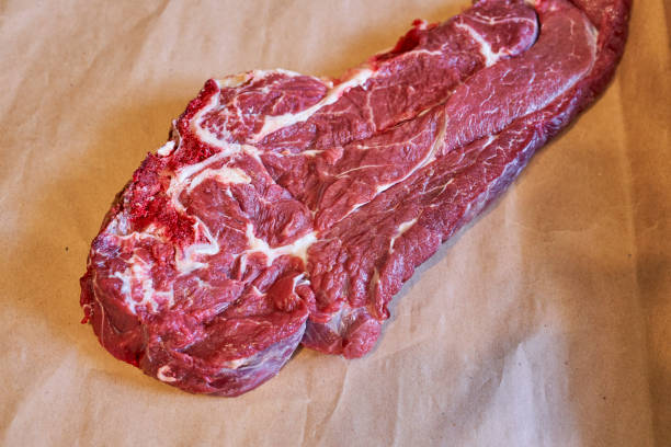 istock Piece of raw roast beef meat 1336174869