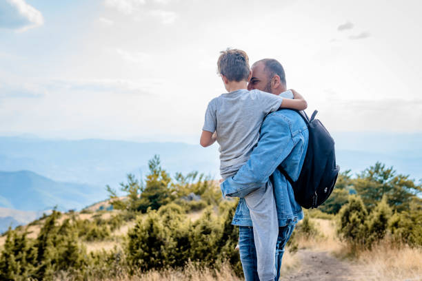 istock Father and son in nature 1336174993