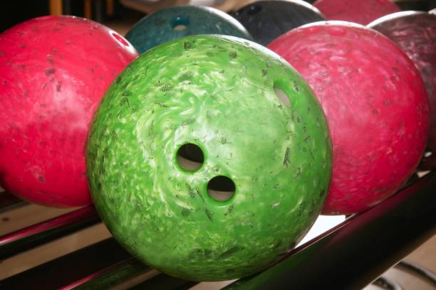 istock Bowling balls red green closeup row 1336176082