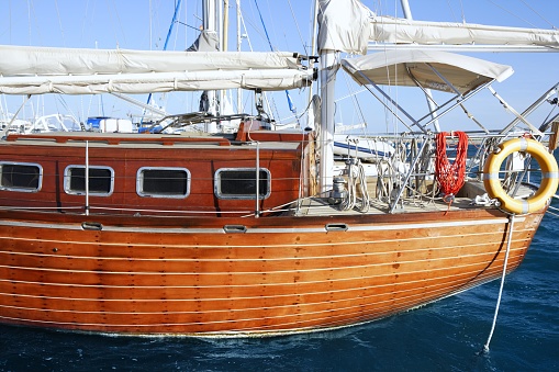 beautiful wooden sailboat on blue sea ocean mediterranean