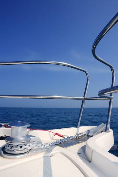 istock boat bow sailing sea with anchor chain winch 1336178065