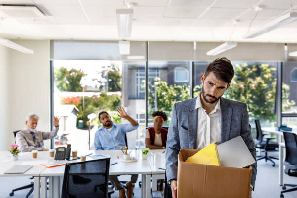 istock A Man Failed at the Job and Leaving the Office. 1336180352