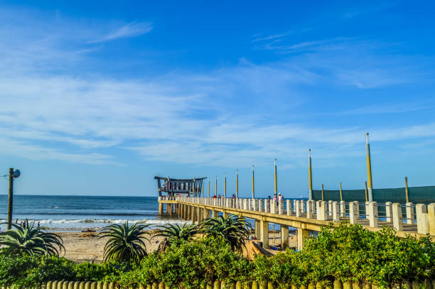 durban ushaka beach pier along golden mile beach in south africa - south africa coastline sea wave imagens e fotografias de stock