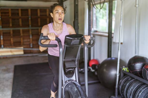 istock Ethnic Woman Exercising In Home Gym 1336192355