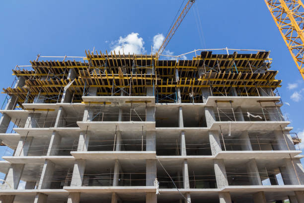 istock Construction of a monolithic multi-storey building. Construction of monolithic walls at a construction site. 1336192385