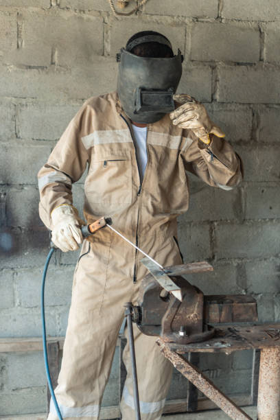 istock Welder welding in backyard in the morning 1336192591